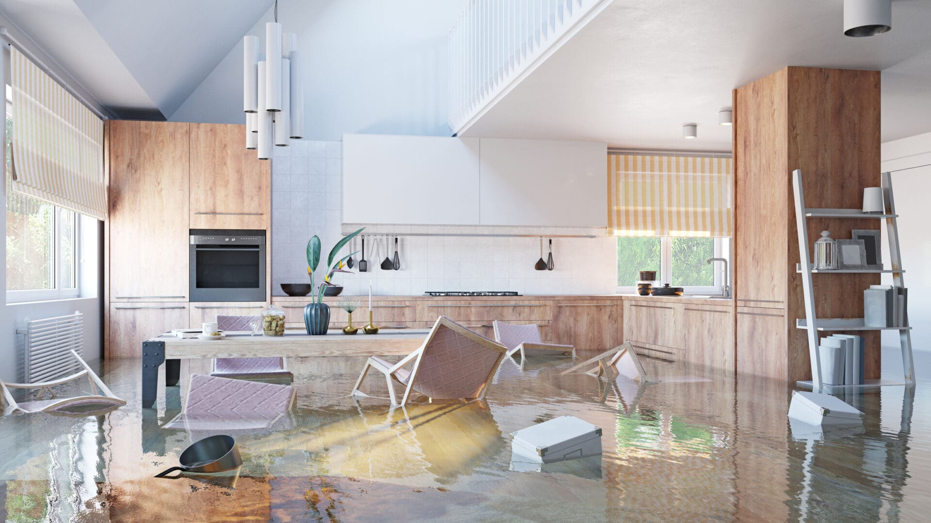 Flooded modern kitchen, chairs submerged.
